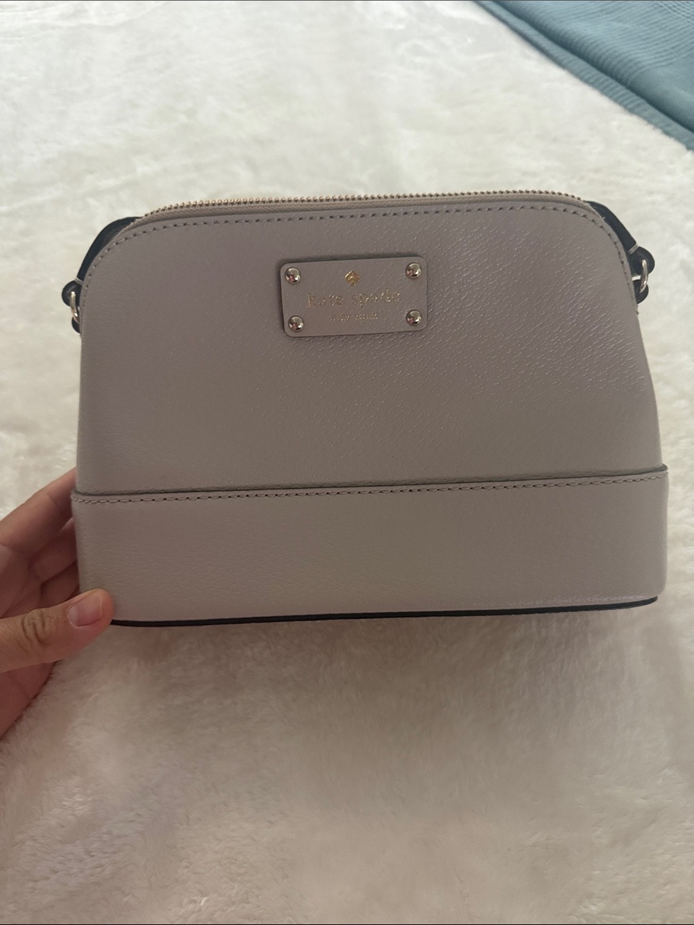 kate spade Pebble Leather Light Gray Crossbody with Gold-Tone Plaque